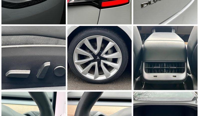 
								Tesla Model 3 full									